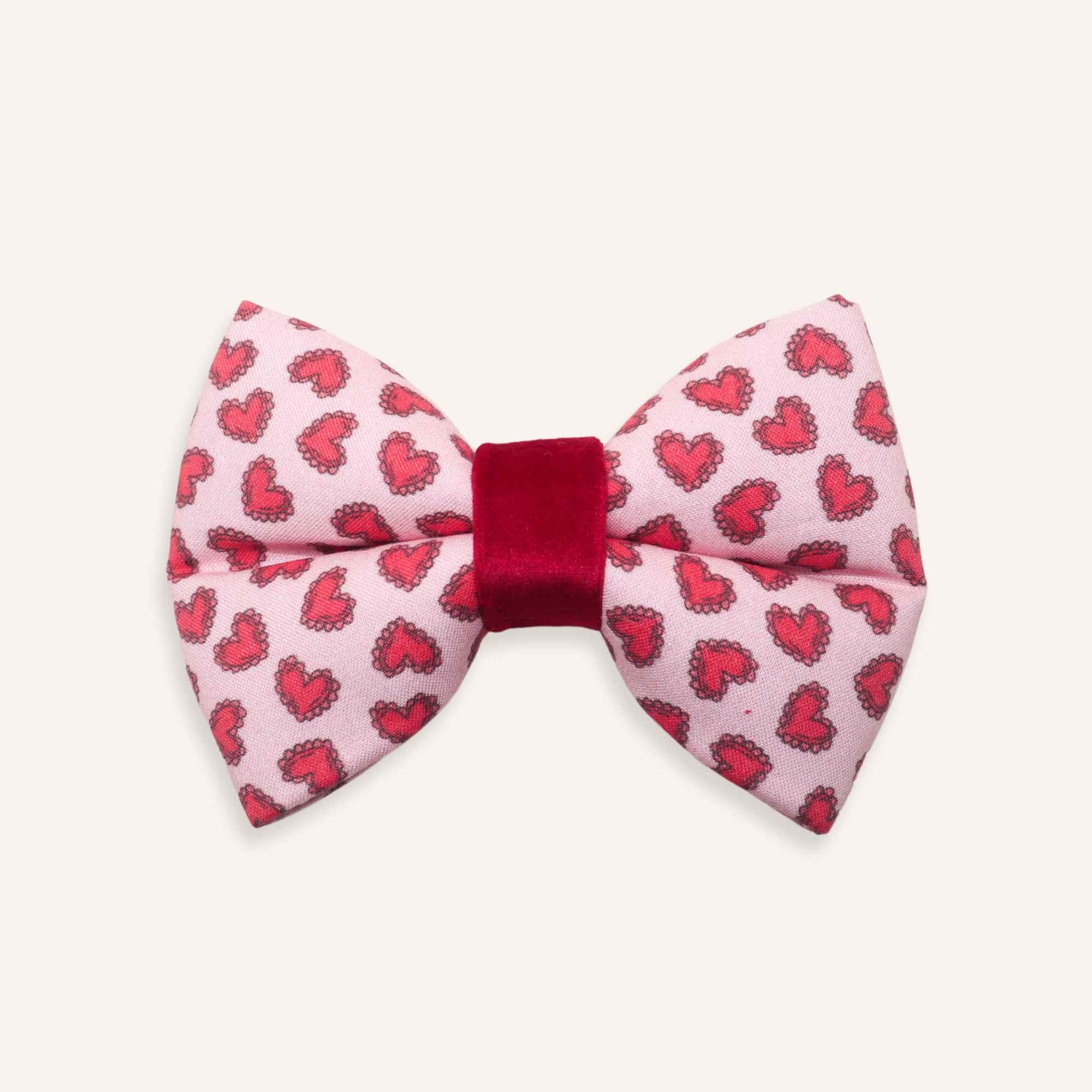 dog Bow tie with red heart pattern on a pink background