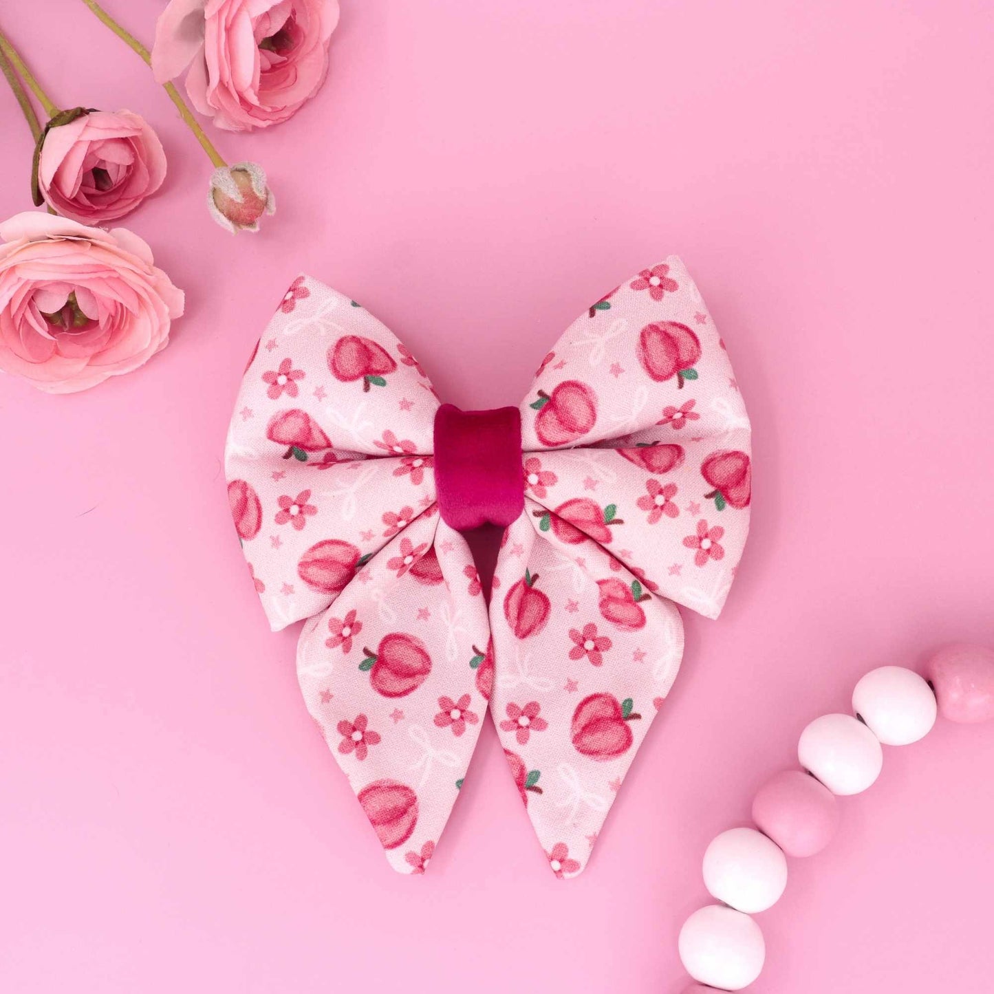 Sweet peach sailor dog bow with pink floral peach pattern