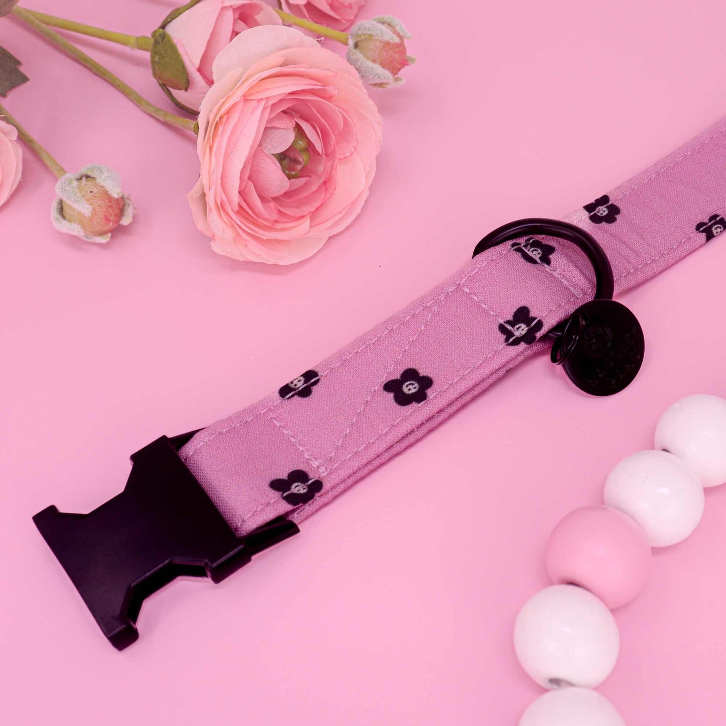 Handmade pink and black dog collar with minimal floral design