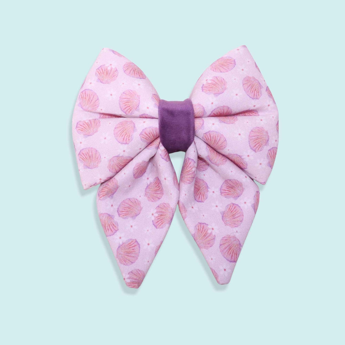 Pink seashell sailor dog bow with pastel coastal design and beach-inspired aesthetic from the Pearl Coast collection