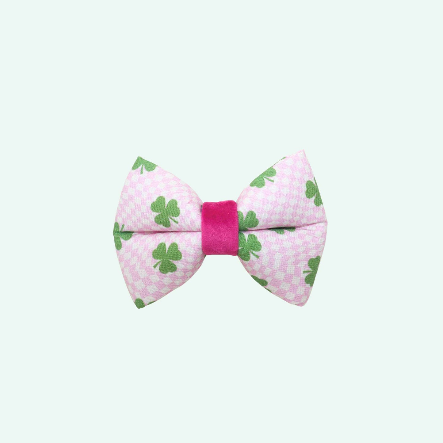 Pixie Clover dog bowtie featuring pink checkered fabric with green clover print, coquette spring dog accessory