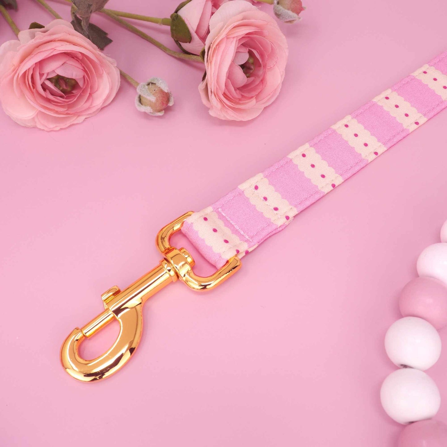 Handmade scalloped pink dog leash with soft cotton fabric and metal hardware.