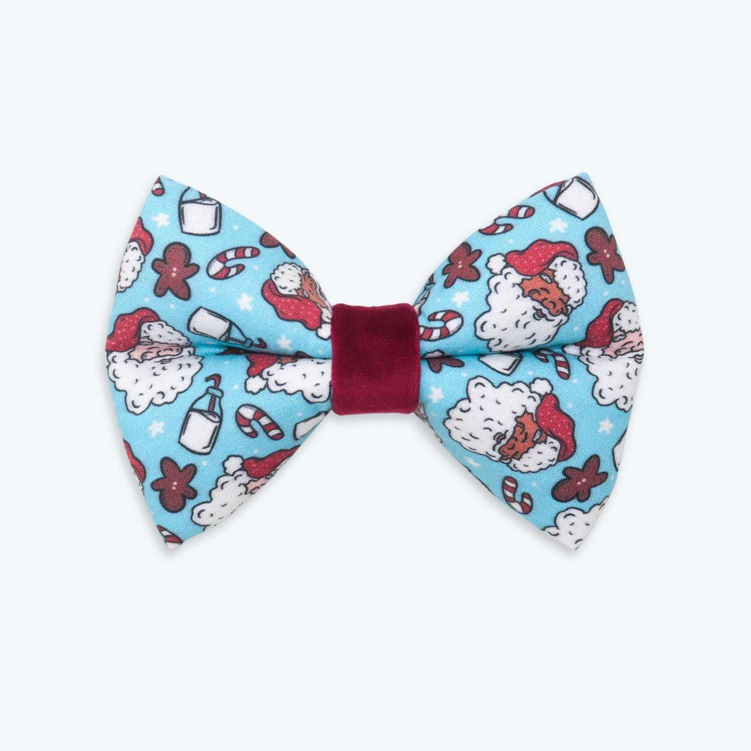 Handmade blue Christmas dog bow tie featuring Santa Claus, gingerbread cookies, candy canes, and festive holiday treats, designed to slide over a dog collar for a cheerful holiday look.
