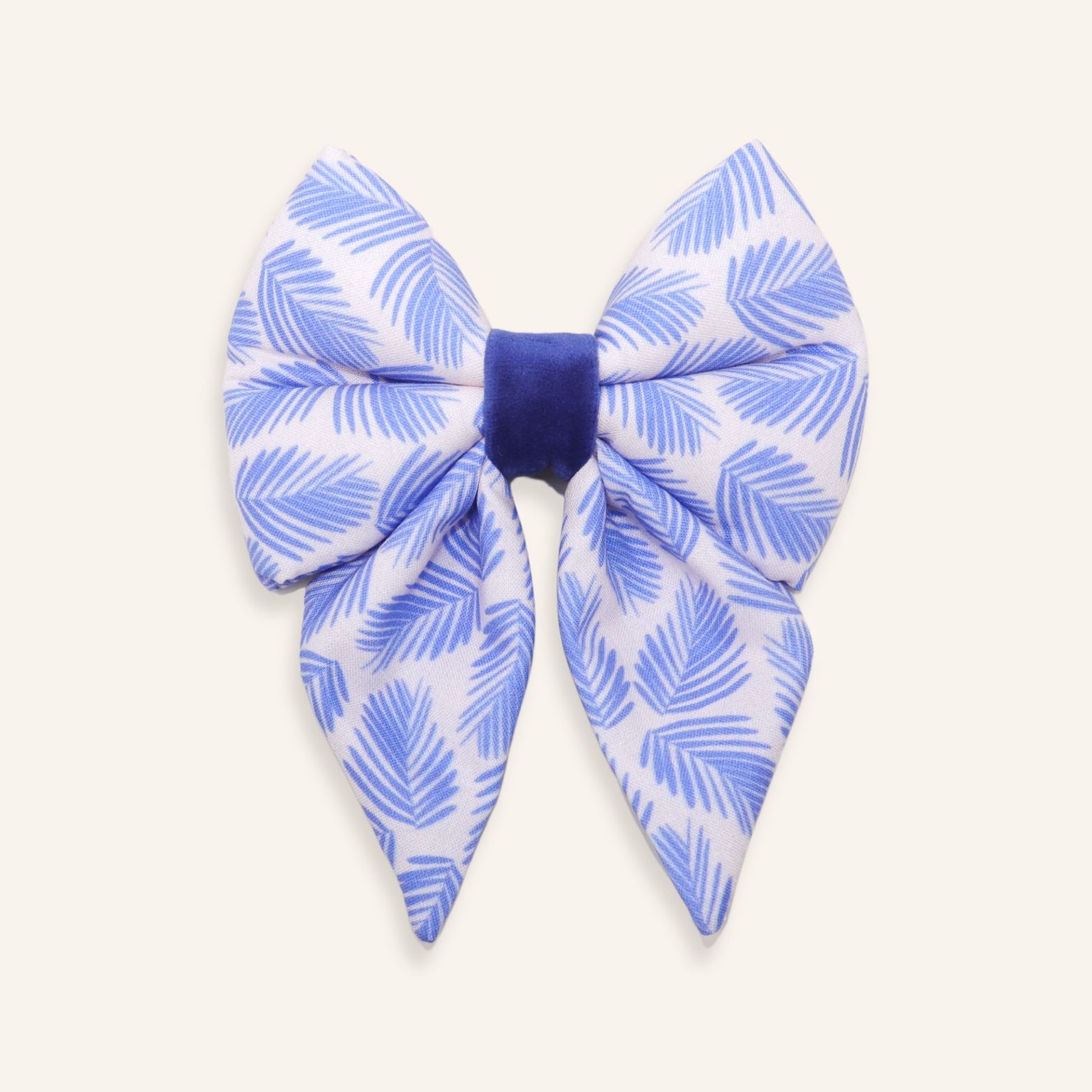 Handmade blue palm leaf dog sailor bow with tropical leaf print, over the collar cotton dog bow for stylish dogs and puppies.