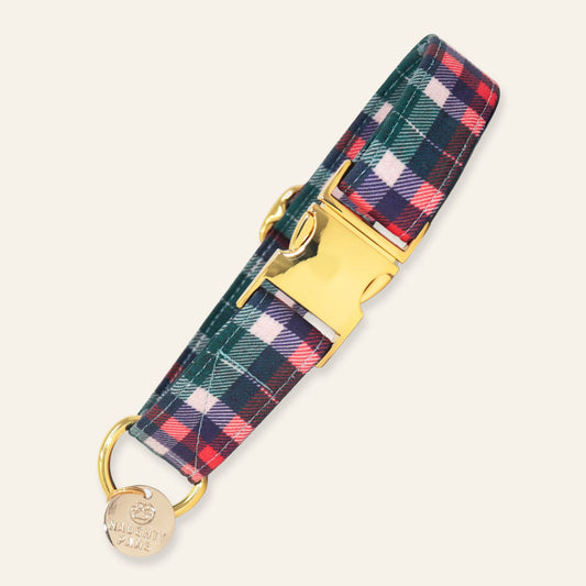 Handmade Christmas plaid dog collar featuring red, green, navy, and pink tartan on soft cotton with adjustable fit and gold metal hardware for dogs and puppies.