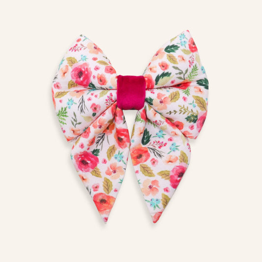 Handmade pink floral dog sailor bow with romantic garden flower print and fuchsia center, over the collar cotton bow for dogs and puppies.