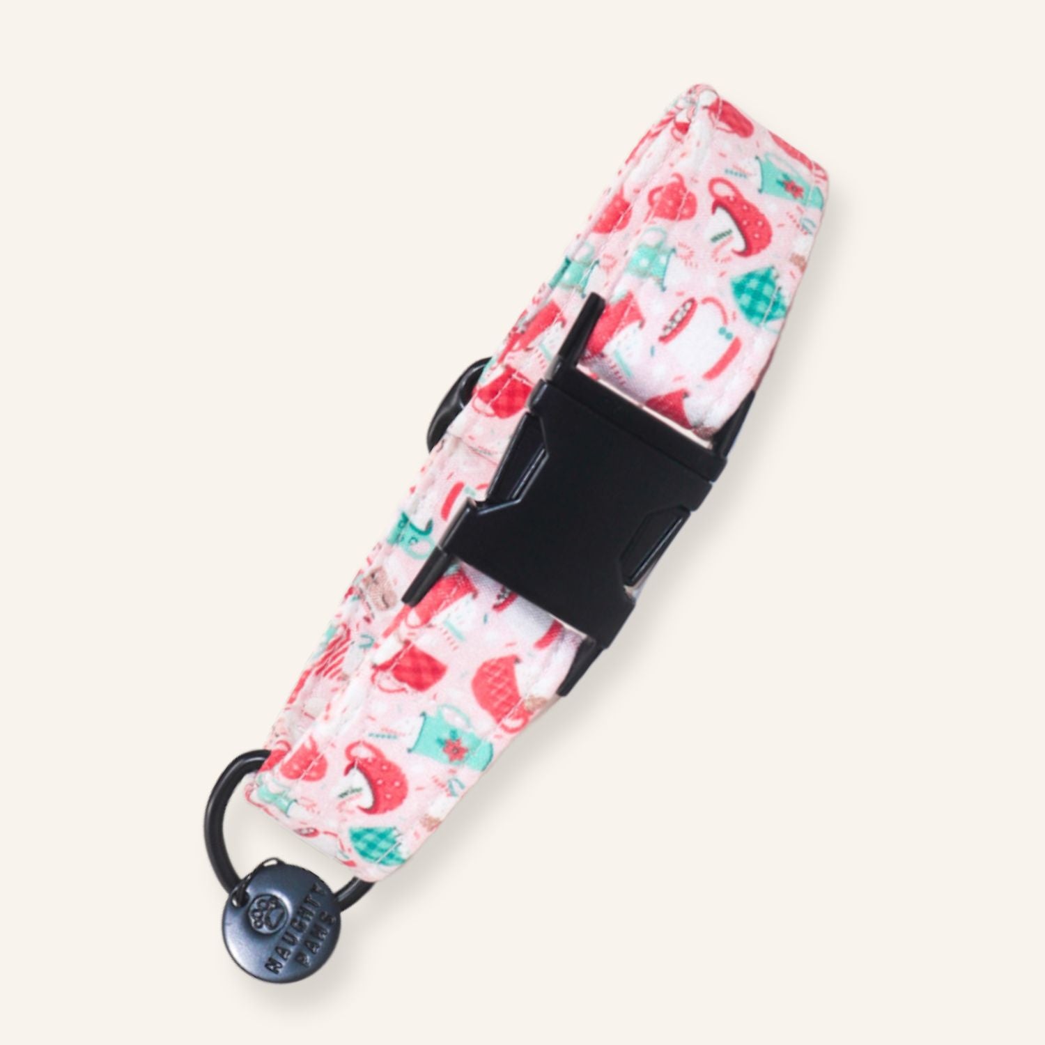 Handmade adjustable pink Christmas dog collar featuring festive mugs, mittens, Santa hats, candy canes, and holiday icons with durable hardware.