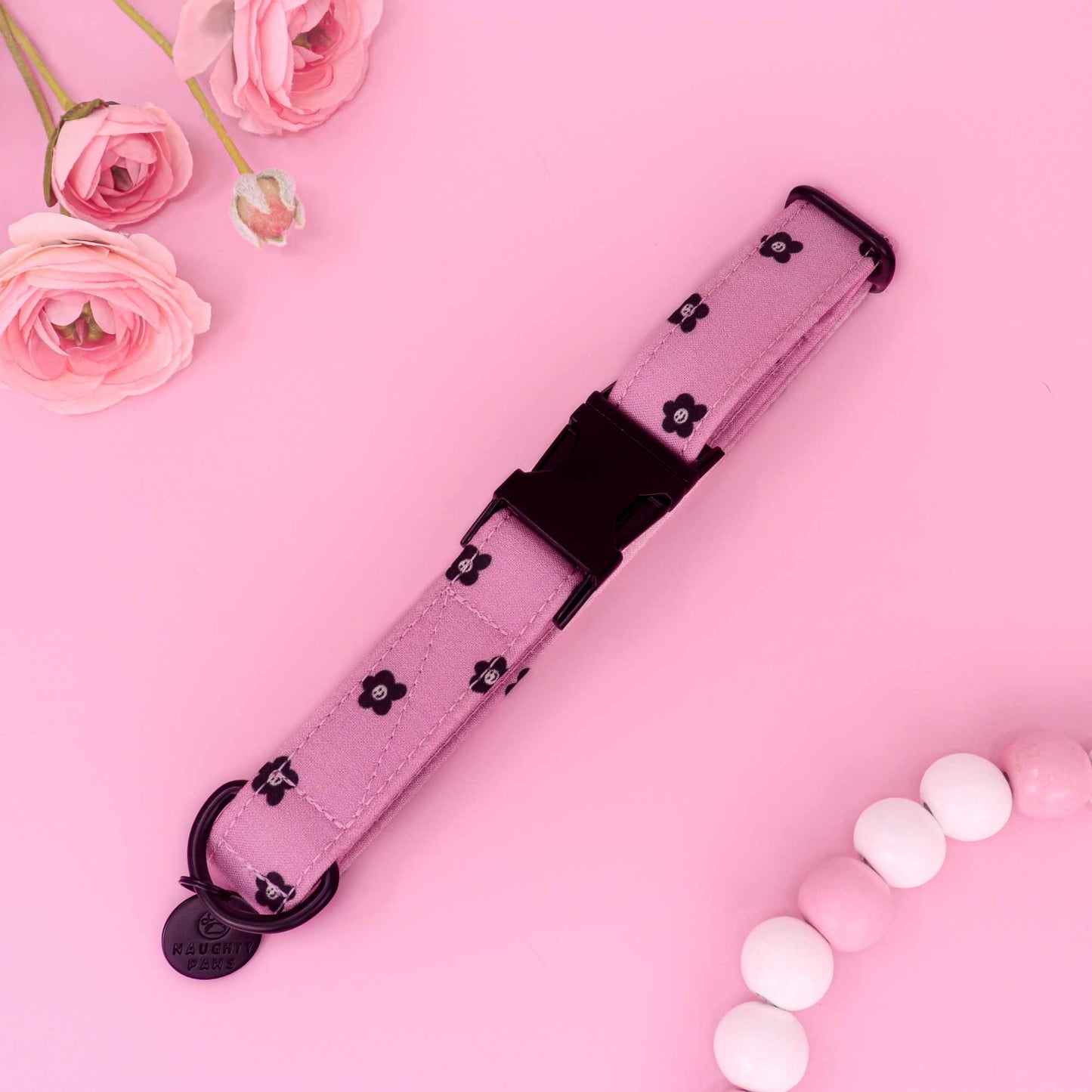 Blush Noir Bloom dog collar with soft pink fabric and black floral pattern
