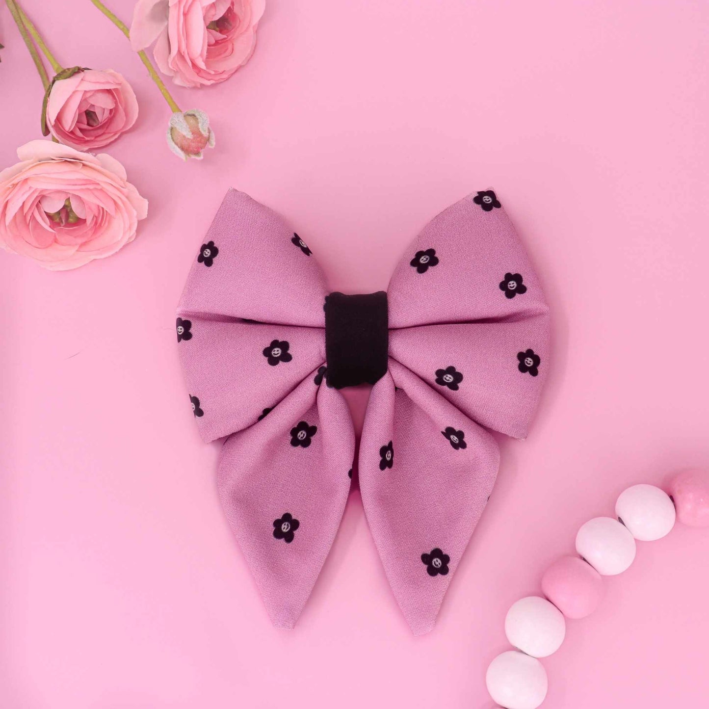 Blush Noir Bloom sailor dog bow with pink fabric and black floral pattern

