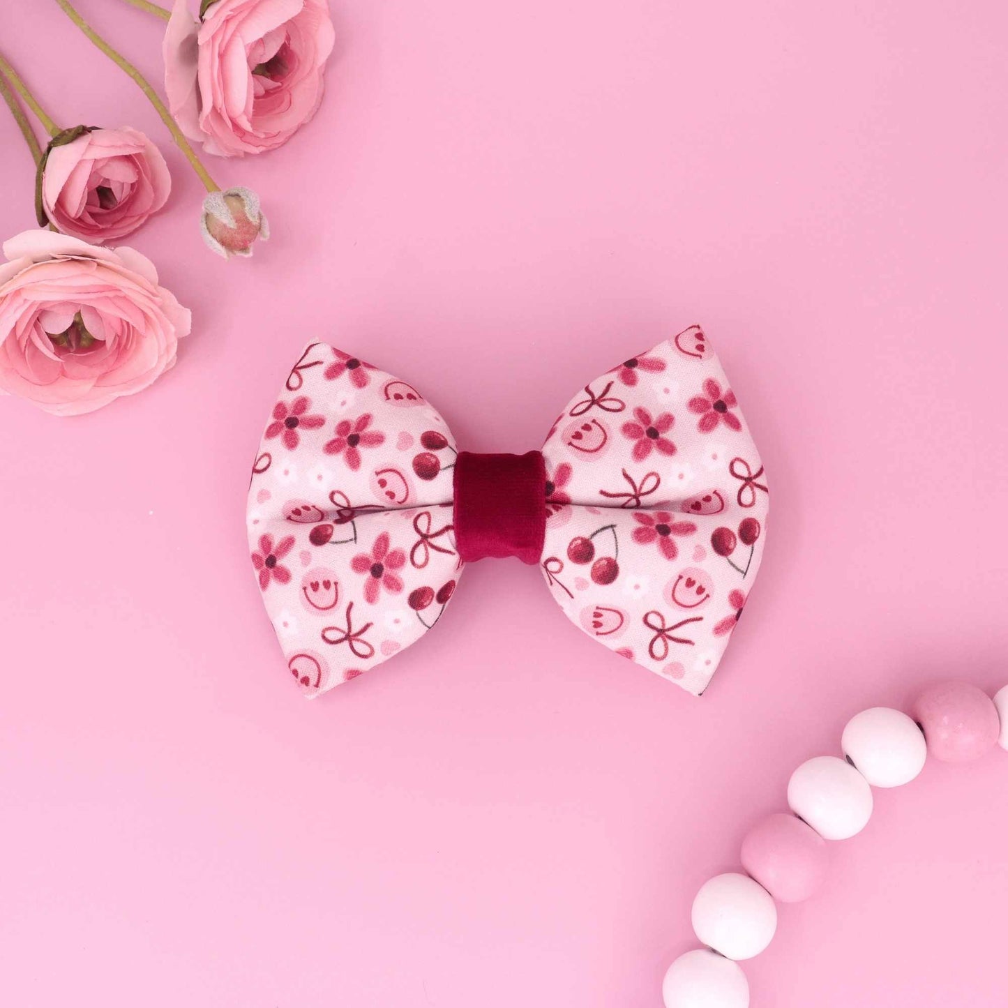 Cherry Delight puffy dog bow tie with cherries daisies heart smiley faces and red bows
