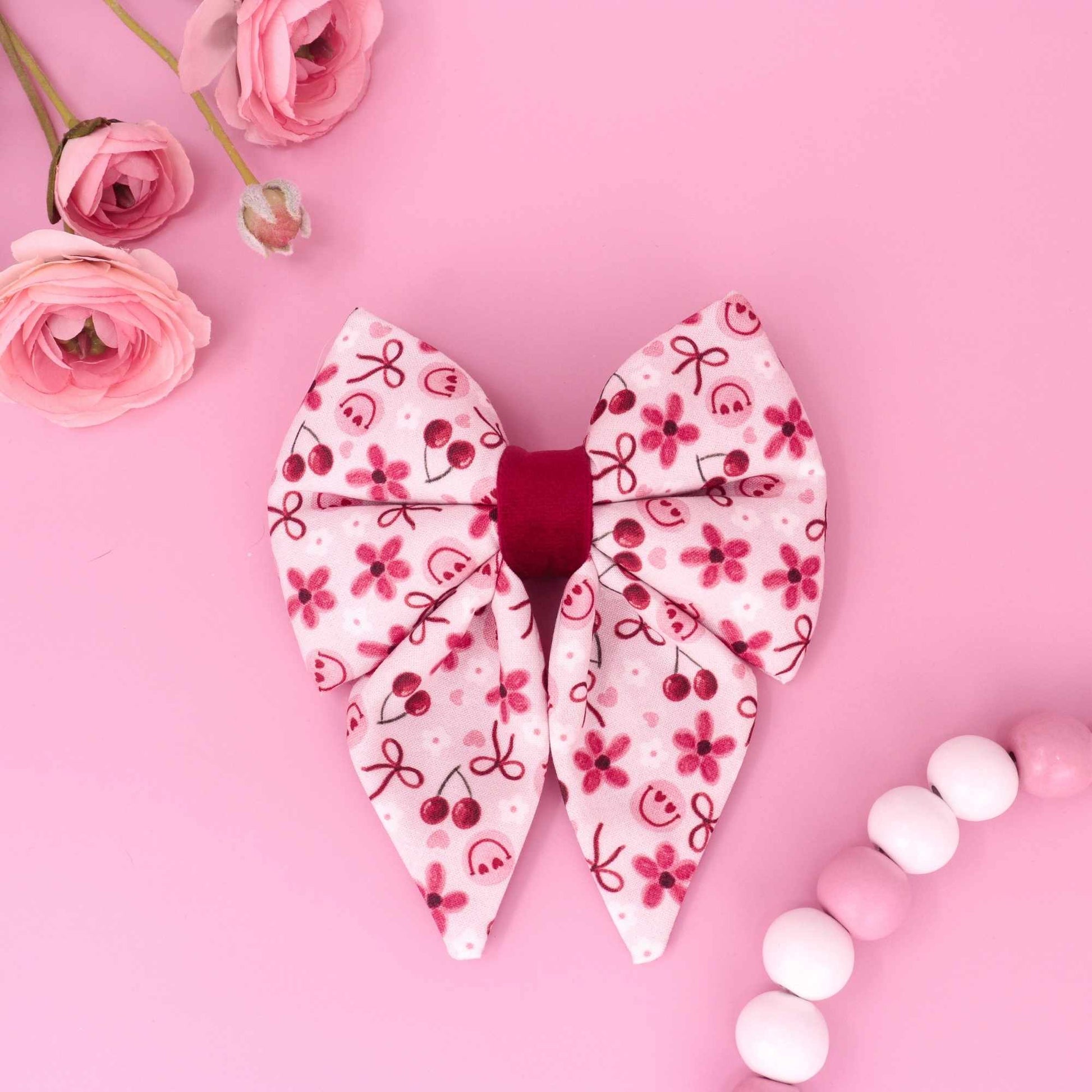Cherry Delight sailor dog bow with cherries daisies heart smiley faces and red bows
