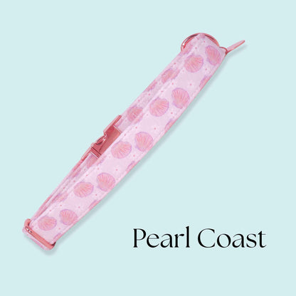 Handmade coastal dog collar with pink seashell print and rose gold buckle inspired by ocean and beach aesthetics
