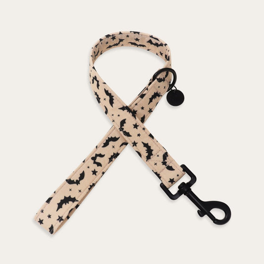 Cream Halloween dog leash featuring black bats, crescent moons and stars