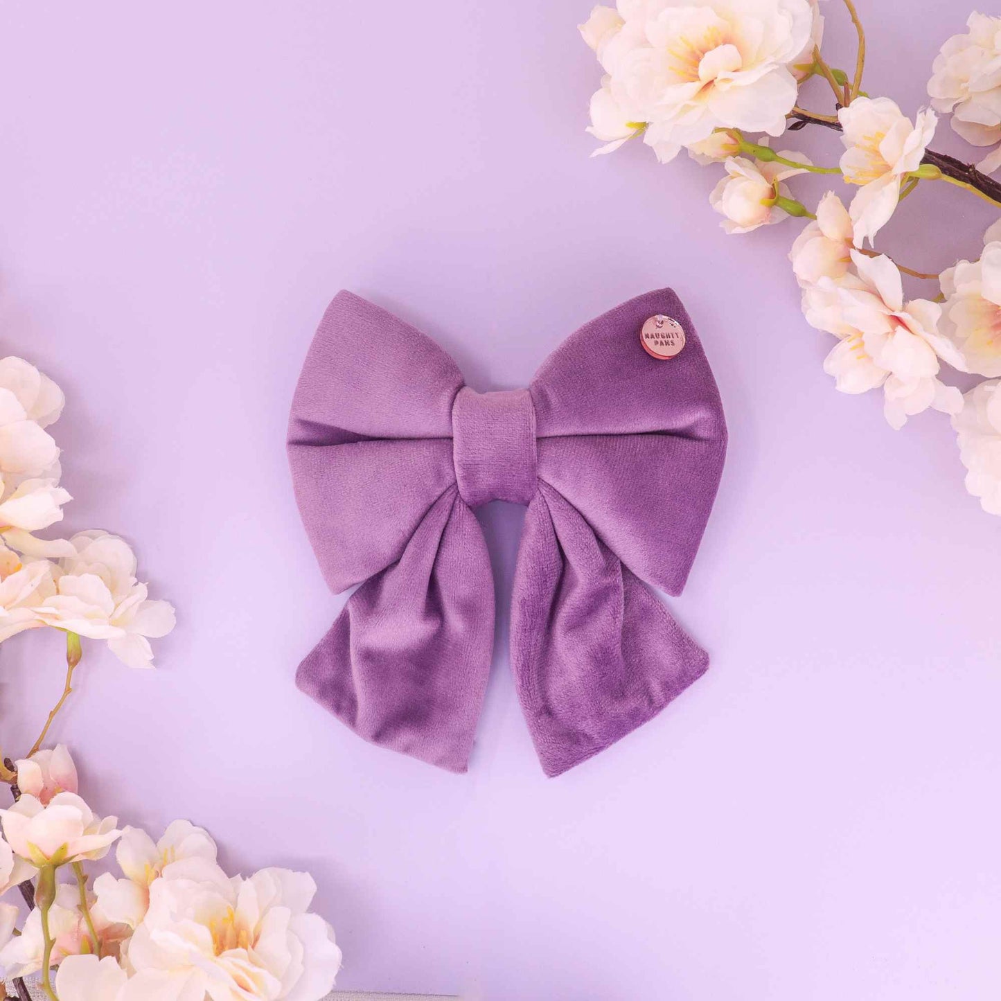 Lavender velvet sailor dog bow with long tails and rose gold charm from the Florence collection