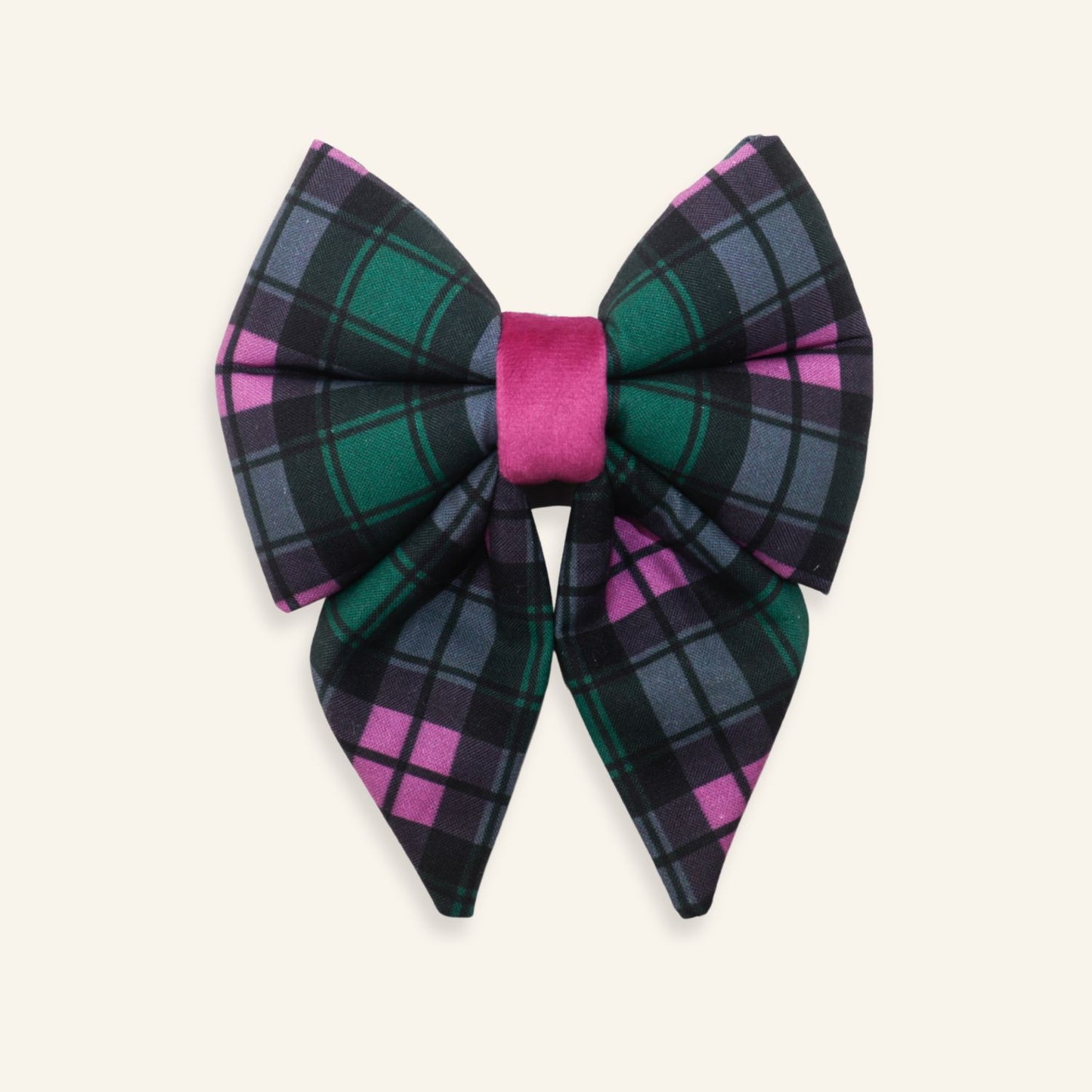 Handmade green tartan plaid dog sailor bow with green, black, gray, and pink accents, designed as an over-the-collar accessory for dogs.