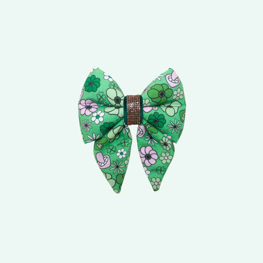 Irish Spring sailor dog bow with tails featuring green floral print and soft pink flowers, spring dog accessory