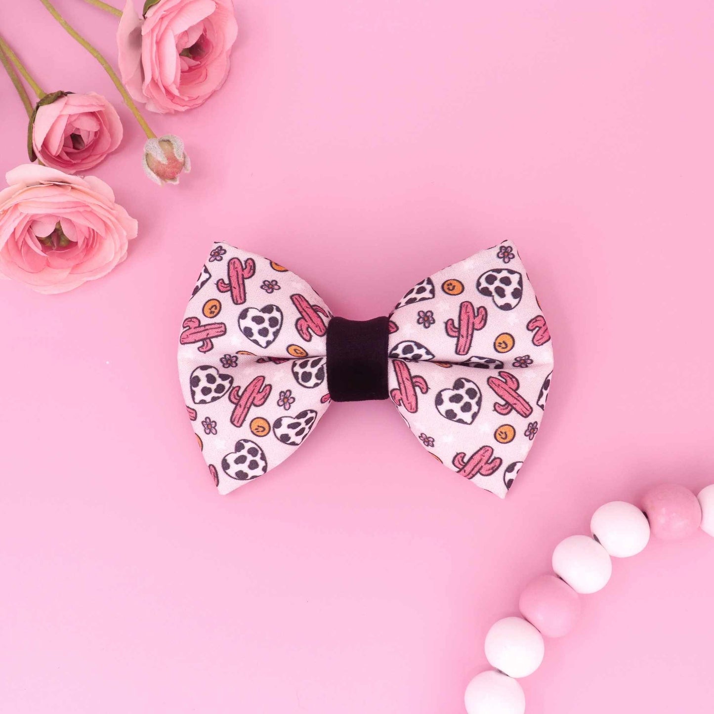 Pink cowgirl puffy dog bow tie with western icons