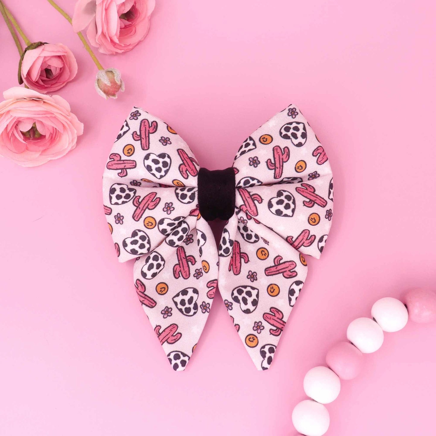 Pink cowgirl sailor dog bow with western icons
