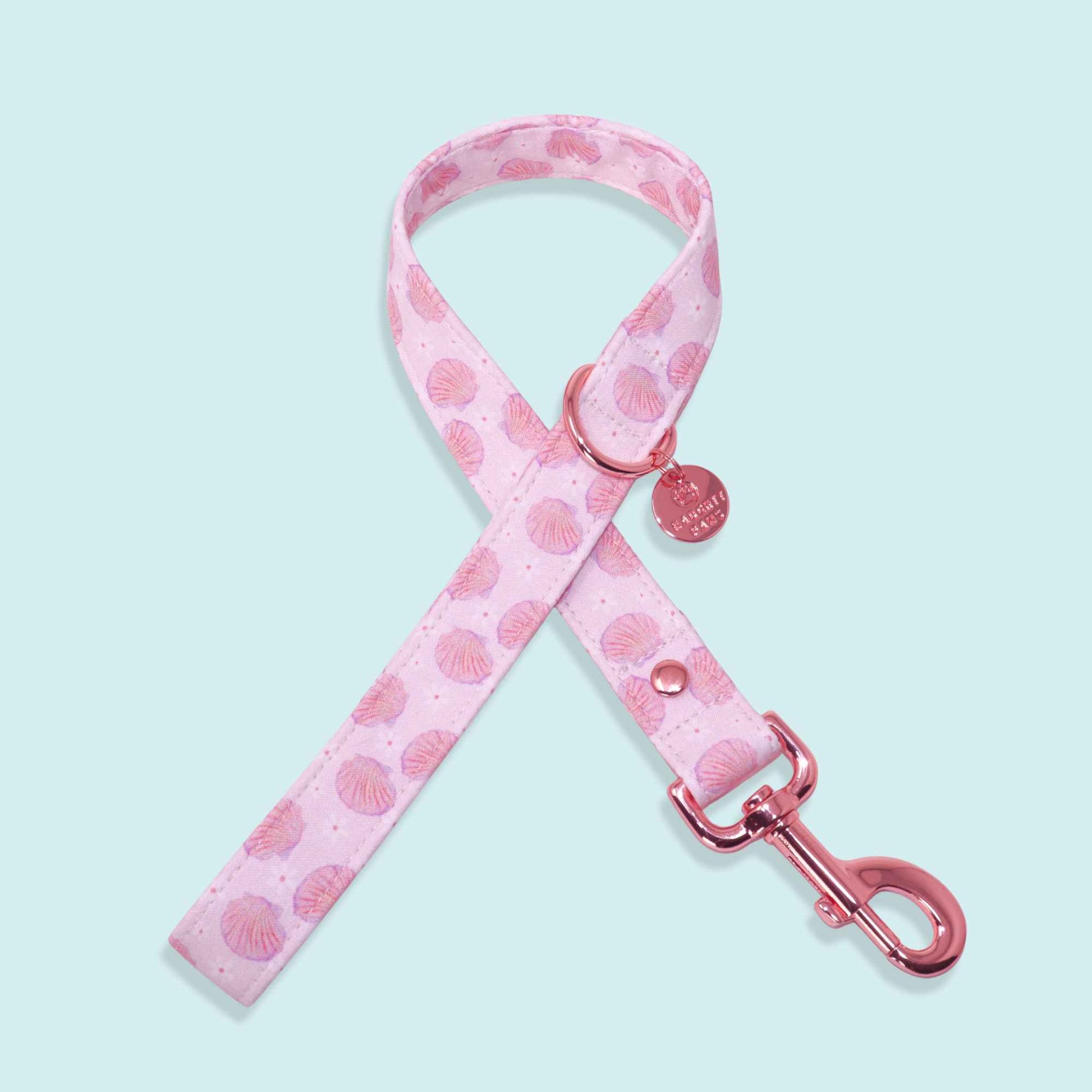 Pink seashell dog leash with rose gold hardware and coastal beach design from the Pearl Coast collection