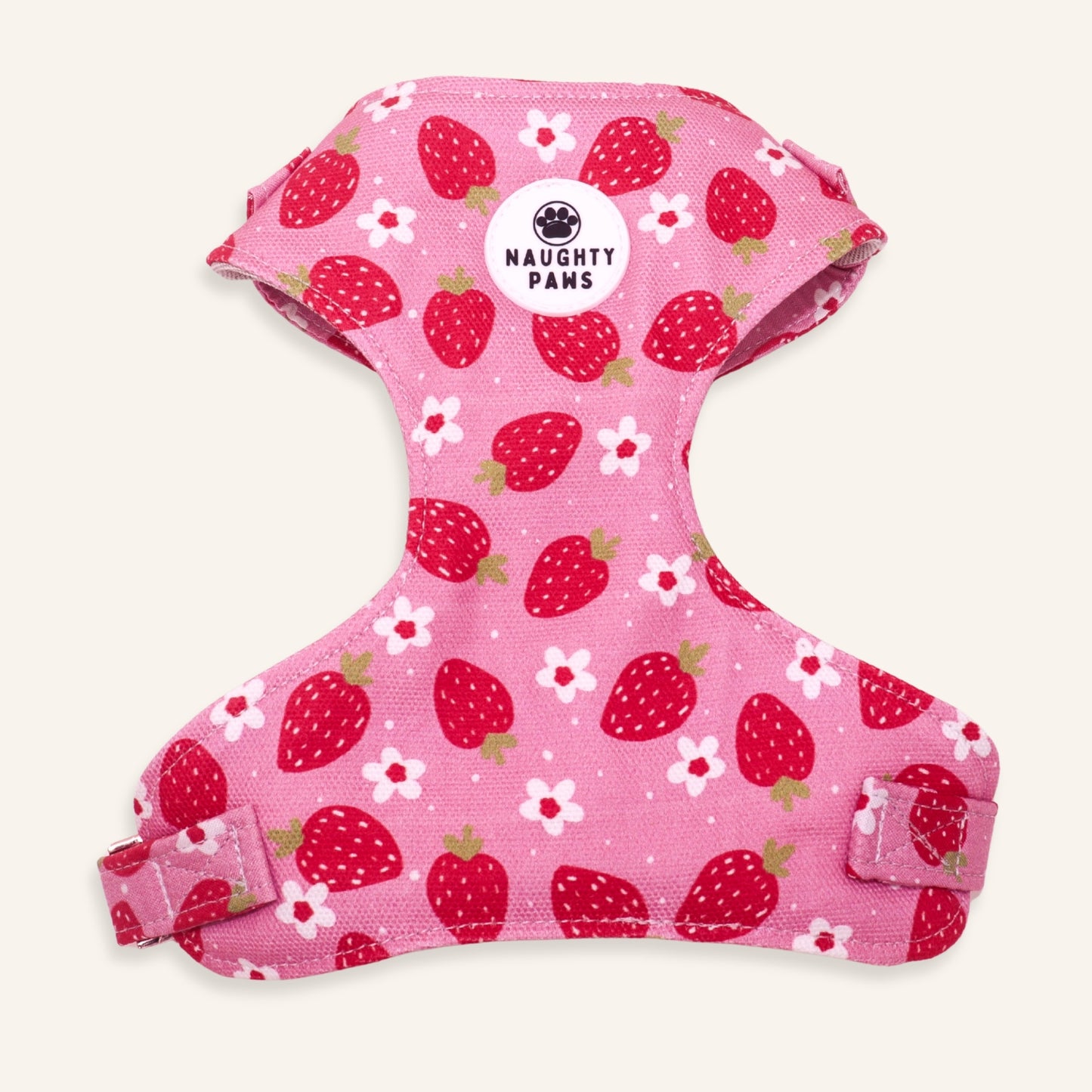 Handmade pink strawberry dog harness with a floral print and adjustable straps for puppies and dogs.