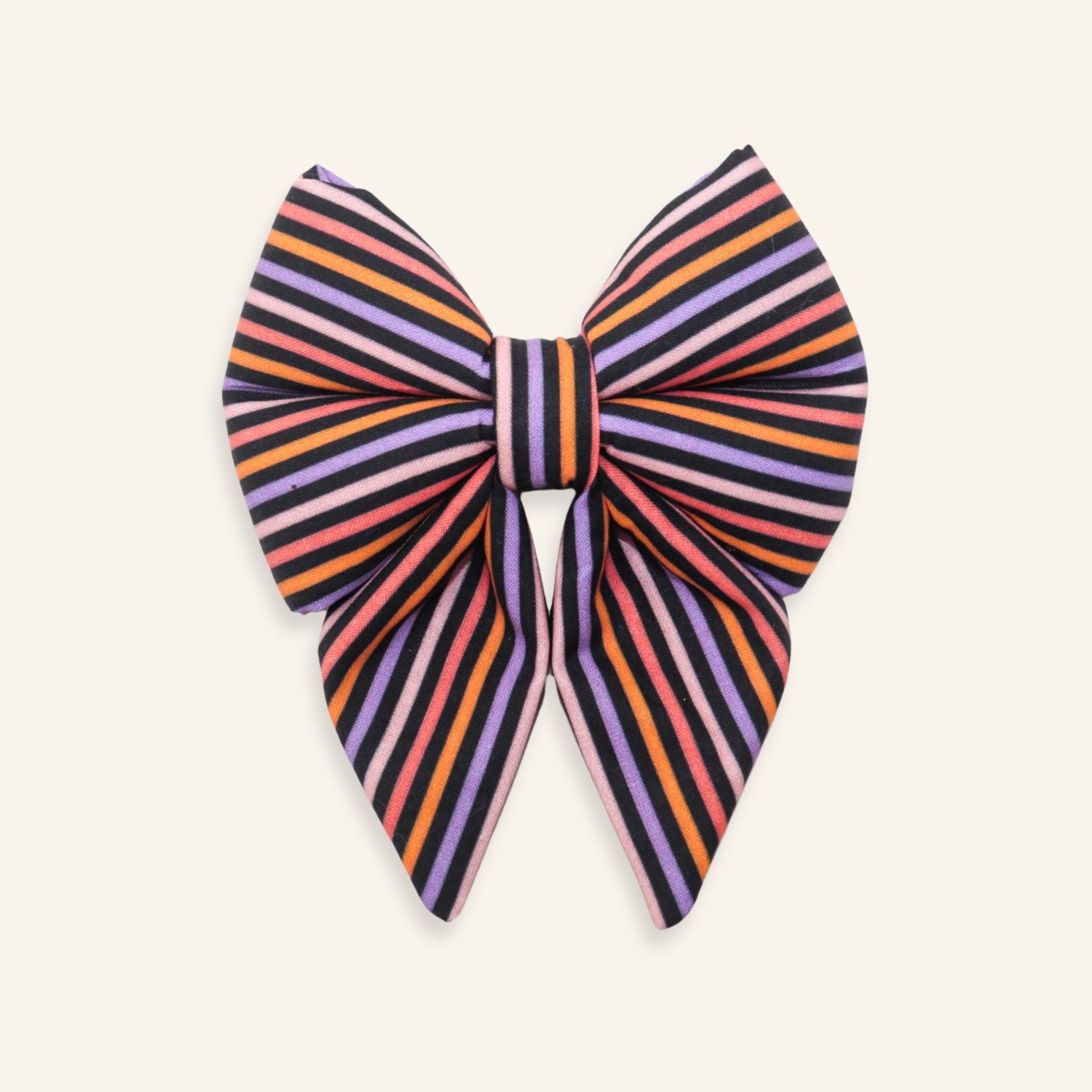 Handmade Halloween dog sailor bow with pink, orange, purple, and black striped fabric, designed as an over-the-collar accessory for dogs.