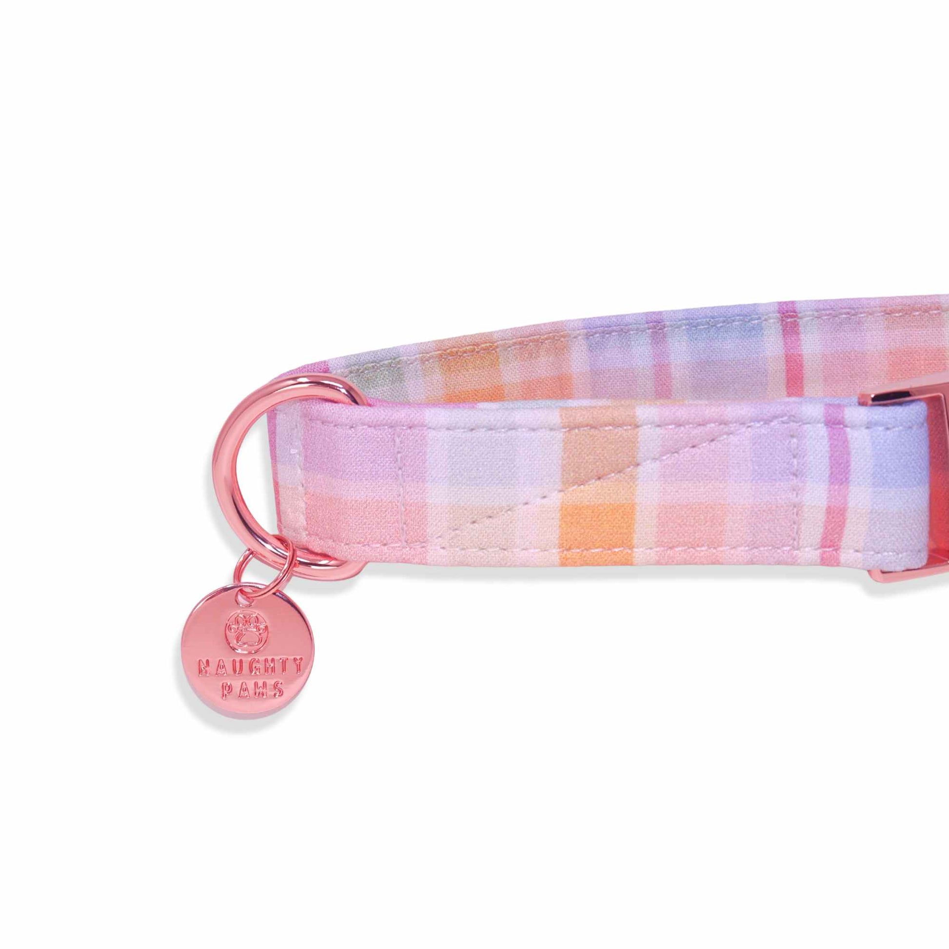 Pastel dog collar with soft pink, peach, and lavender plaid pattern inspired by summer sunsets