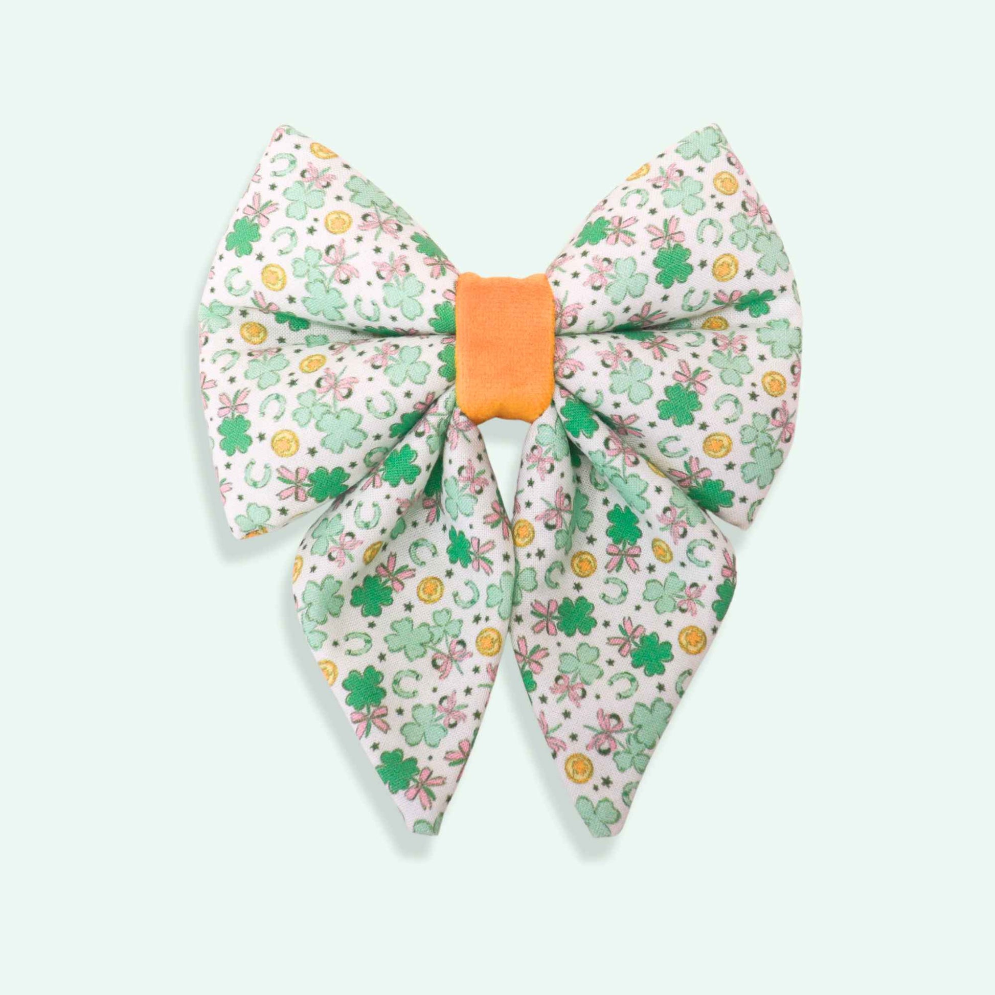 Clover Charm sailor dog bow with tails featuring lucky clover charm print, green St Patrick’s Day dog accessory
