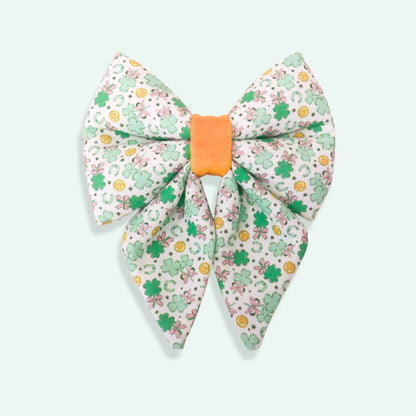 Clover Charm sailor dog bow with tails featuring lucky clover charm print, green St Patrick’s Day dog accessory
