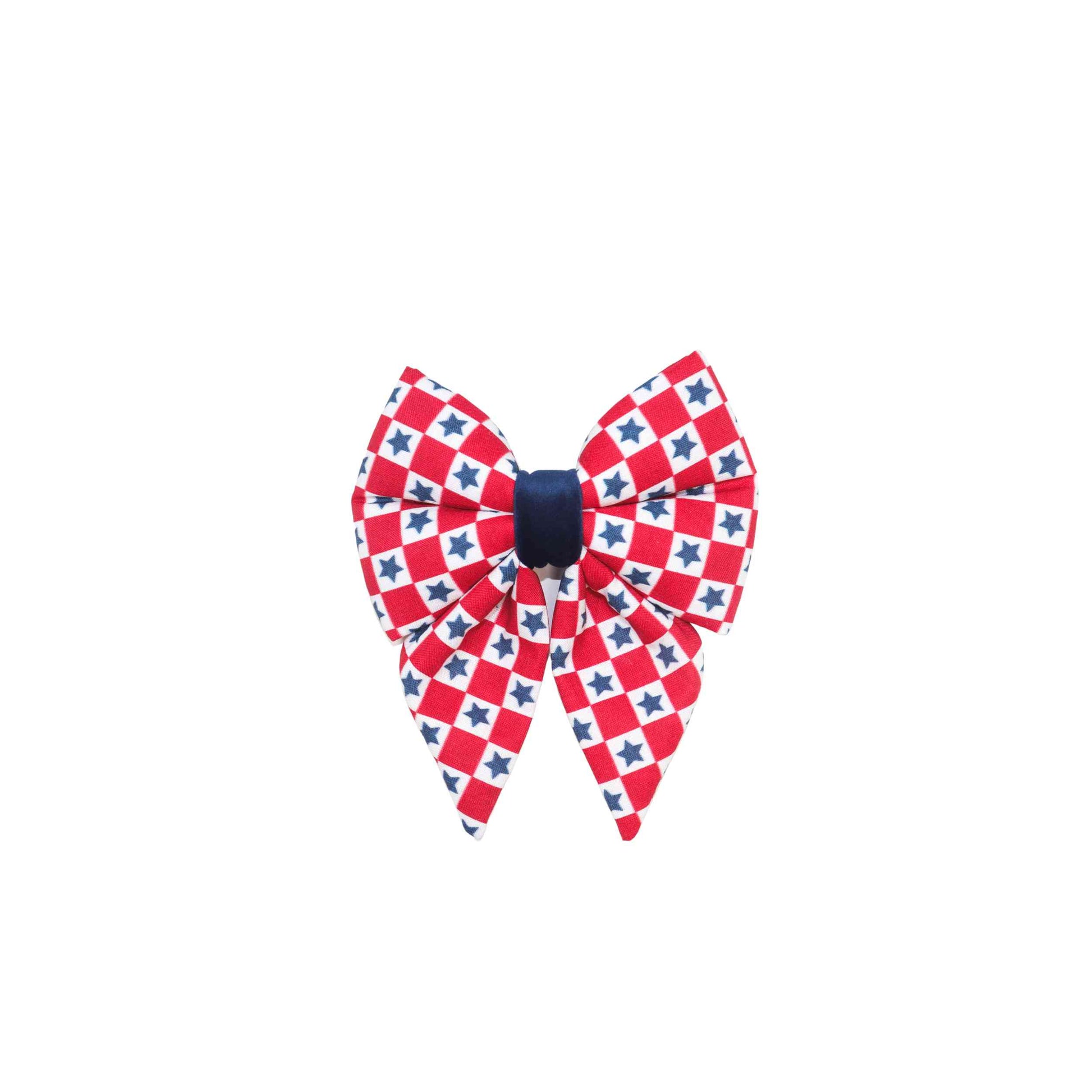 Show your patriotism with our 'American' red checker with blue stars dog sailor bow tie, perfect for the 4th of July celebration. Our bow tie features a classic red checker design with blue stars, adding a touch of Americana to your furry friend's wardrobe. The bow tie easily attaches to your pet's collar with two elastic loops for a secure and comfortable fit. 