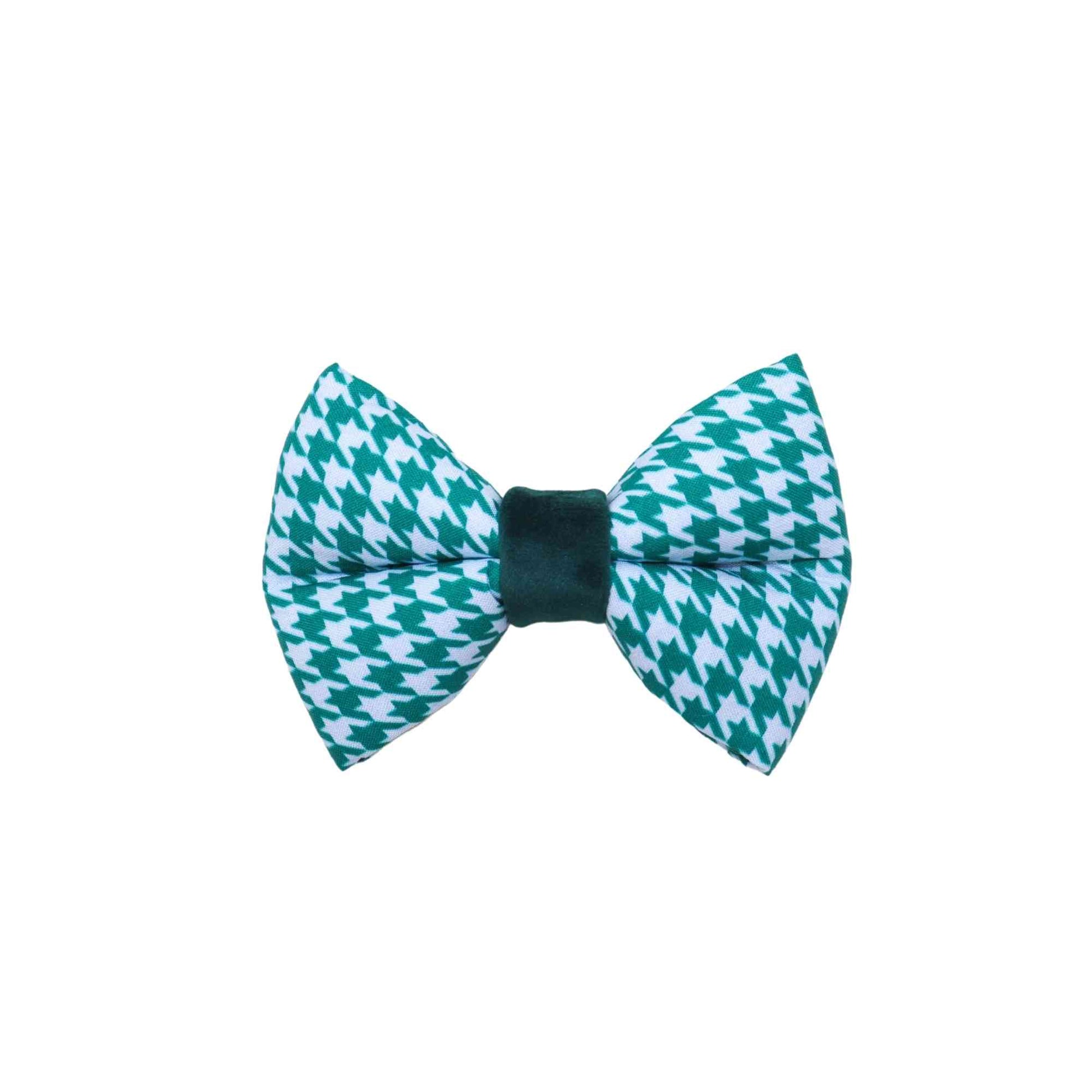 Dress up your furry companion with our green and blue houndstooth boy dog bow tie! Designed to fit over your pet's collar, our bow tie features two elastic loops that keep it securely in place. Available in small, medium, large, and extra-large sizes, our bow tie is perfect for dogs of all breeds and sizes. The houndstooth pattern adds a touch of style to any outfit, making it perfect for special occasions or everyday wear. Shop now and give your boy dog a stylish accessory he'll love!