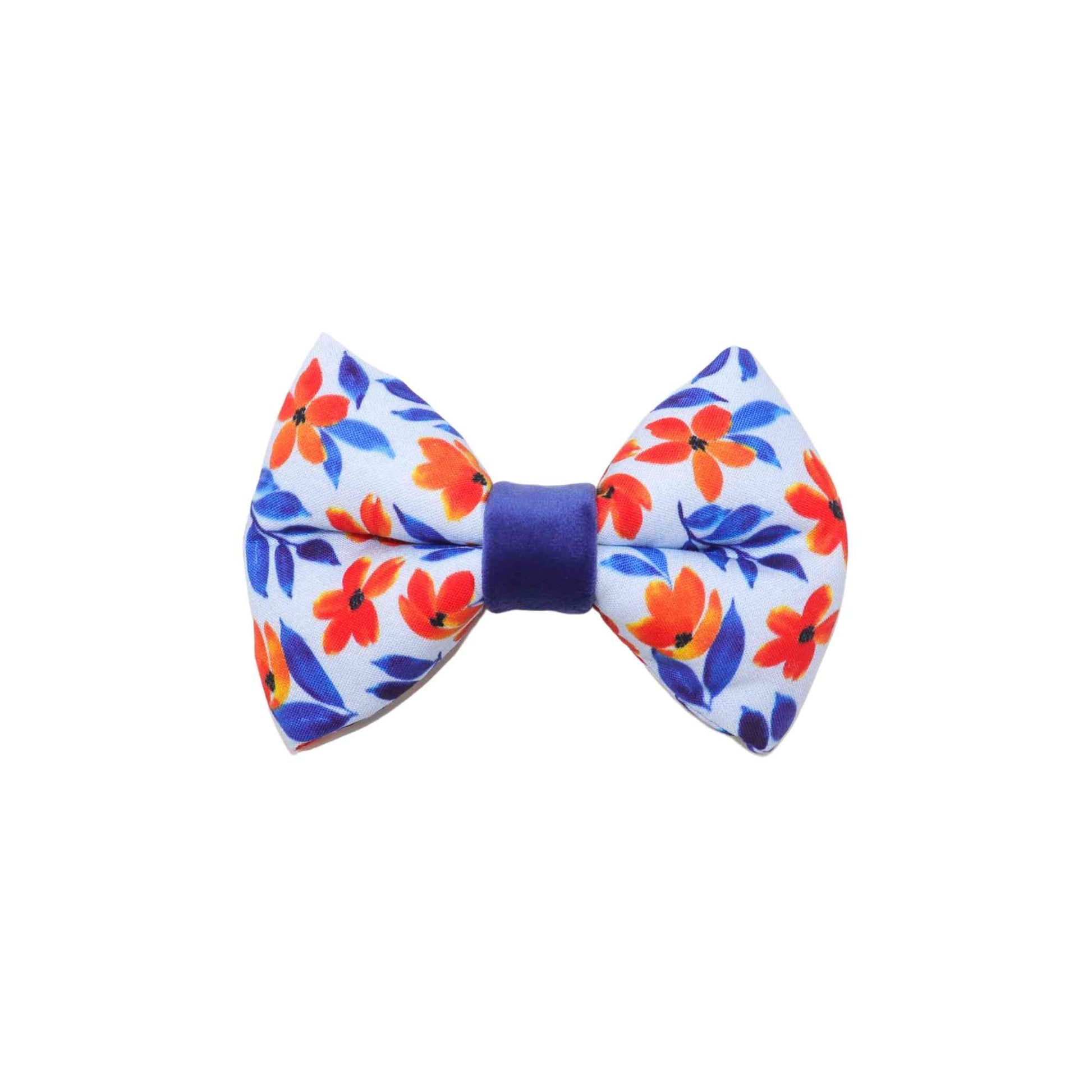 Make your furry friend look dapper in our orange and blue floral summer dog bow tie! Our bow tie is designed to fit over your pet's collar, making it easy and comfortable to wear. Suitable for large to small breeds, our bow tie is made of high-quality materials, ensuring durability and long-lasting use. The beautiful floral design adds a touch of style to any summer outfit, whether it's for a special occasion or everyday wear. Shop now and give your furry friend a high-quality accessory they'll love!