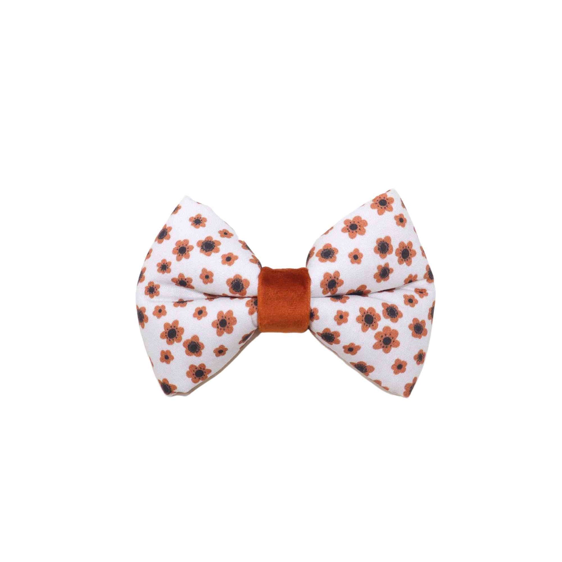 Elevate your furry friend's style with our handmade Boho Brown Floral Dog BOW TIE! Our bow tie is designed to fit over your pet's collar, making it easy and comfortable to wear. The unique brown floral design adds a touch of bohemian style to any outfit, making it perfect for special occasions or everyday wear. 