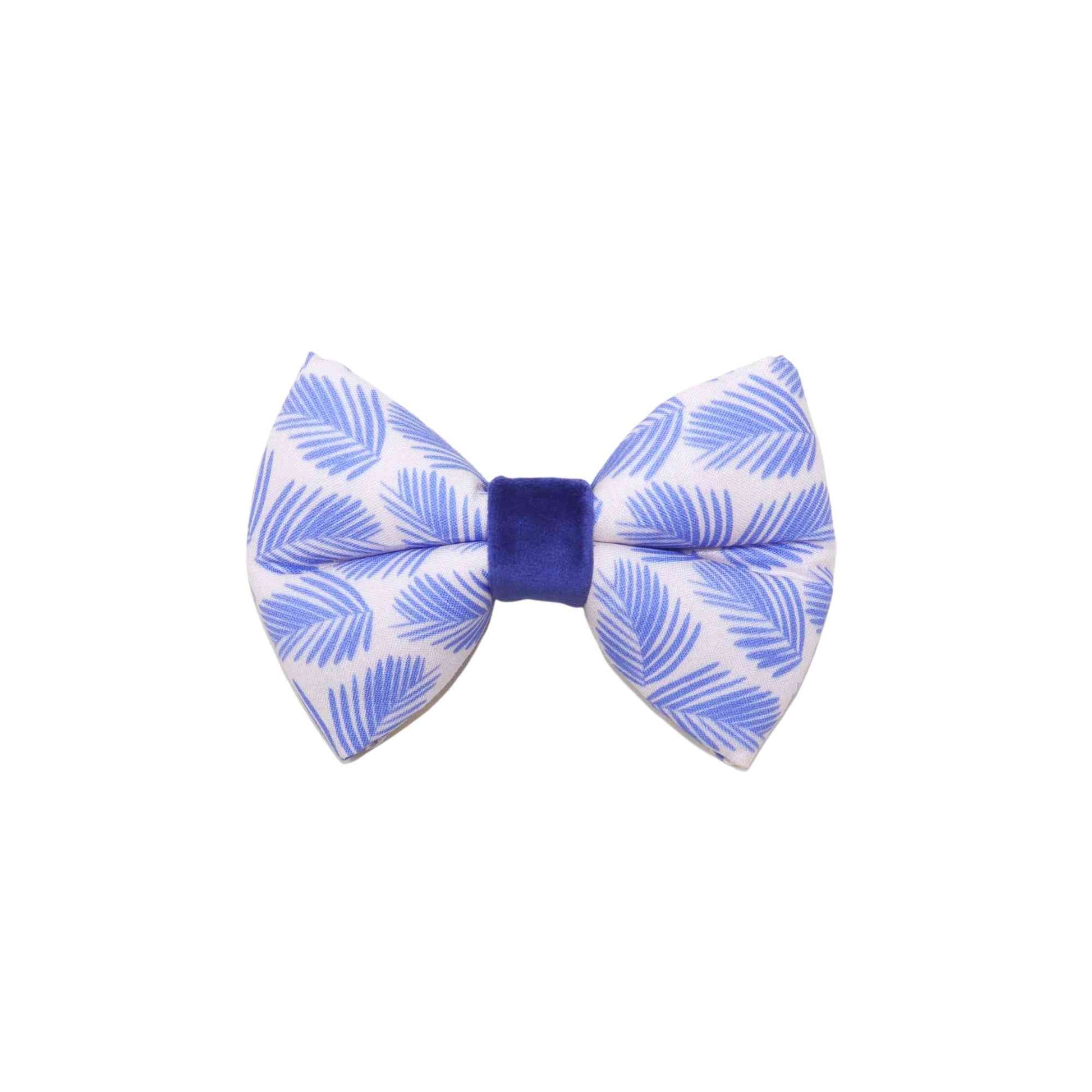 Get your furry friend ready for summer with our "California" Blue Palms summer dog bow tie! Our bow tie is designed to fit over your pet's collar, making it easy and comfortable to wear. Suitable for large to small breeds, our bow tie is made of high-quality materials, ensuring durability and long-lasting use. 
