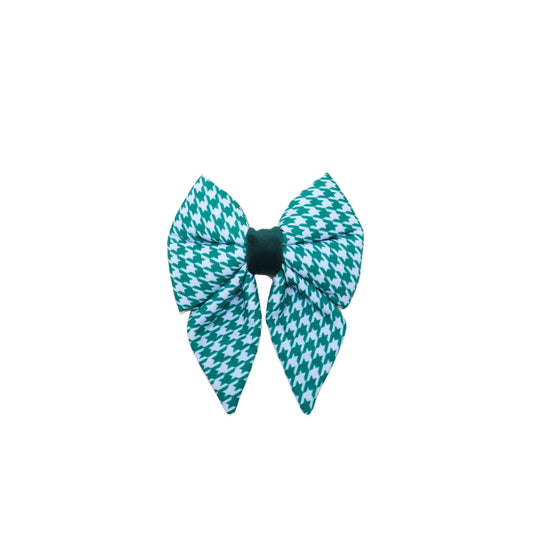 Upgrade your pup's accessory game with our Green and Blue Houndstooth Boy Dog Sailor Bow! This handmade bow is designed to slip easily over your pup's collar and comes in a range of sizes to fit dogs of all breeds and sizes. Made with high-quality fabric and expert craftsmanship, this bow is both durable and comfortable. The green and blue houndstooth print is perfect for the stylish boy pup and adds a touch of sophistication to any outfit. 