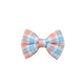 Upgrade your furry friend's style with our orange and blue tartan dog bow tie! Designed to fit over your pet's collar, this bow tie is easy and comfortable to wear. With its vibrant orange and blue tartan pattern, this bow tie adds a pop of color to any outfit, making it perfect for special occasions or everyday wear. The bow tie features two elastic loops for a secure and comfortable fit. Shop now and give your furry friend a stylish accessory that is sure to turn heads!