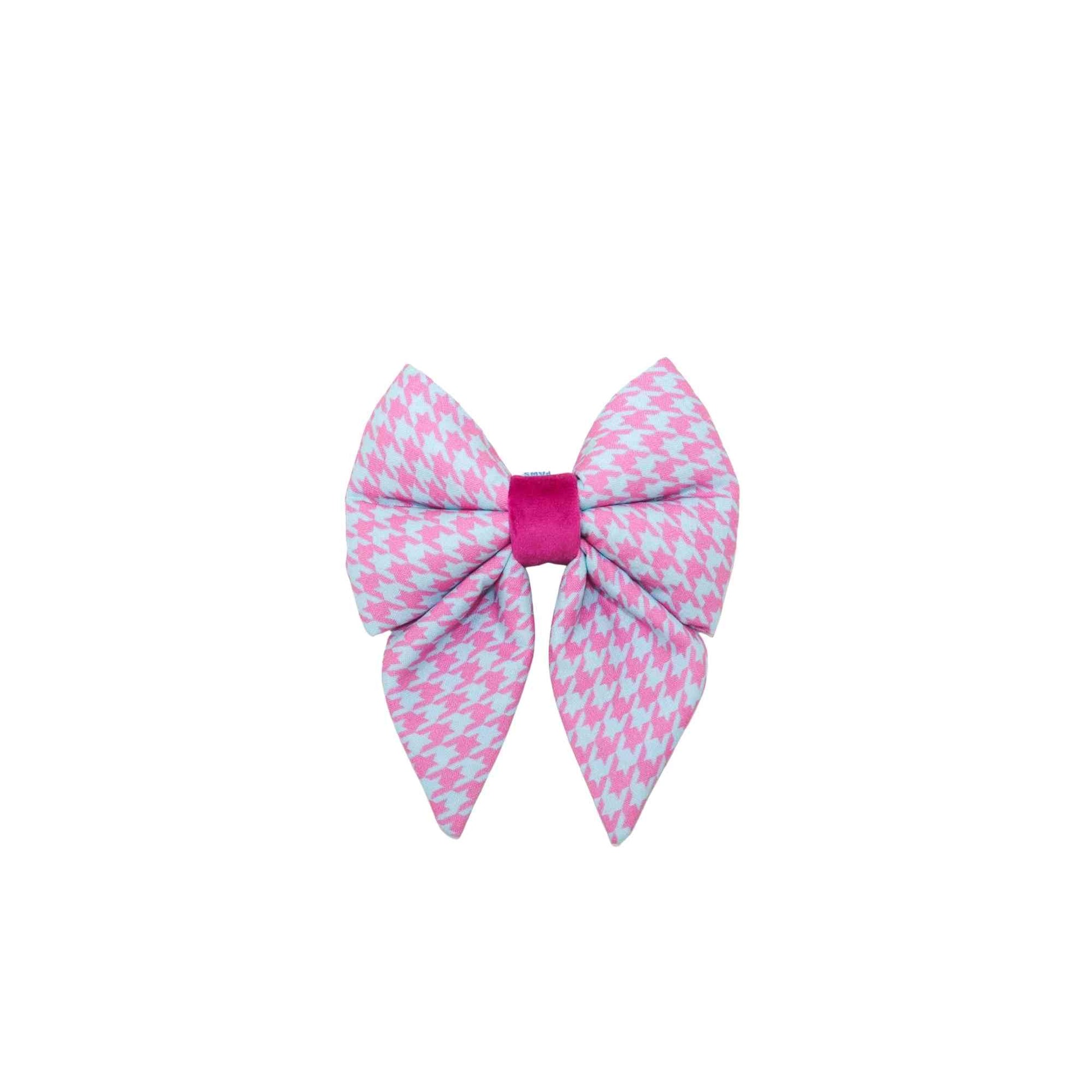 Make your pup the most stylish one in the park with our Pink and Blue Houndstooth Girl Dog Sailor Bow! This handmade bow is designed to slip easily over your pup's collar and comes in a range of sizes to fit dogs of all breeds and sizes. Made with high-quality fabric and expert craftsmanship, this bow is both durable and comfortable. The pink and blue houndstooth print is perfect for the fashionable girl pup and adds a touch of sophistication to any outfit.