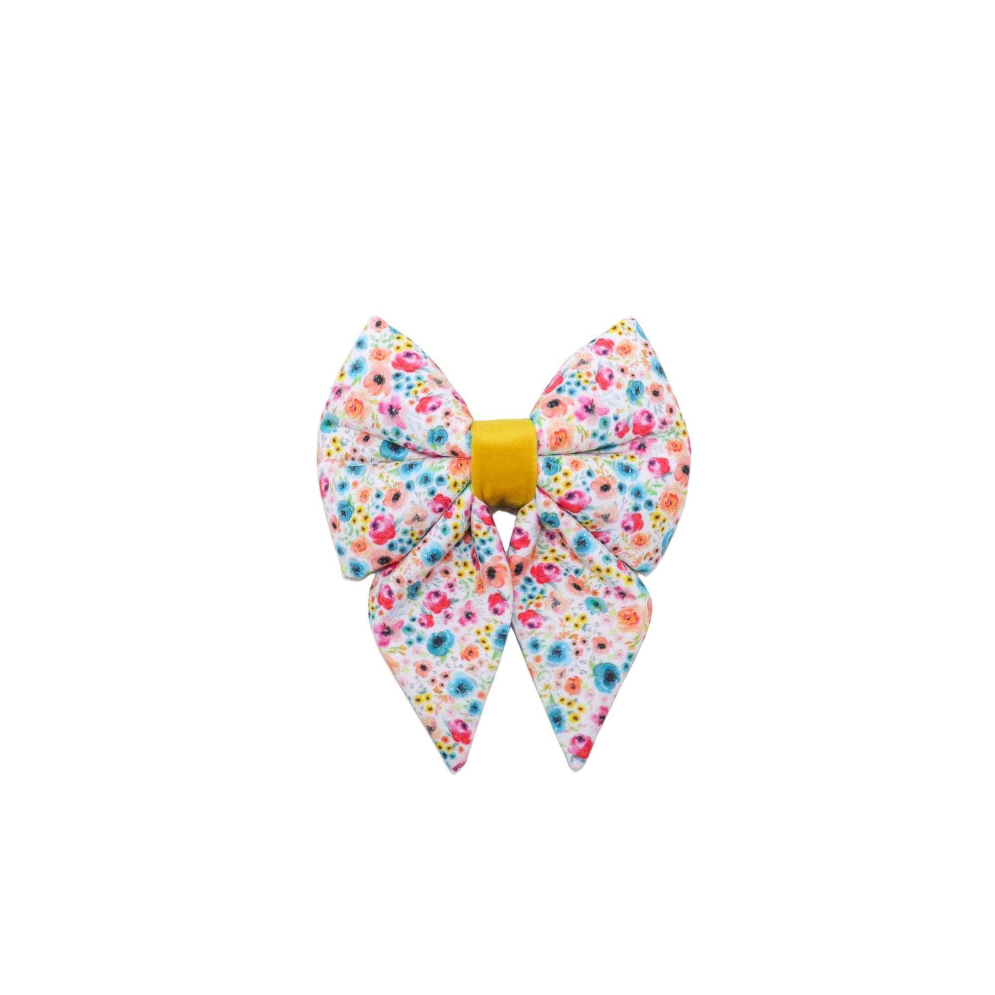 Add a touch of elegance and charm to your furry friend's look with our Pink and Turquoise Floral Girl Dog Sailor Bow! Handmade with high-quality fabric and expert craftsmanship, this bow is designed to slip easily over your pup's collar and comes in a range of sizes to fit all breeds. The beautiful pink and turquoise floral print is perfect for adding a pop of color to any outfit. 