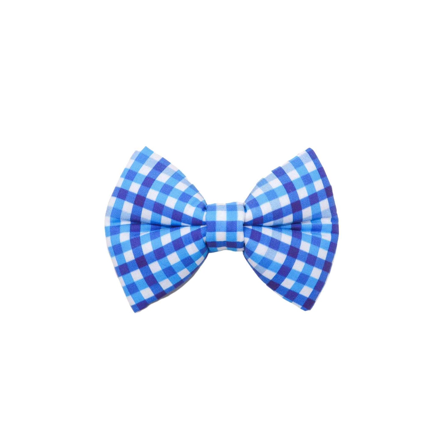 Add a touch of charm to your furry friend's summer style with our royal blue gingham dog bow tie! Our bow tie is designed to fit over your pet's collar, making it easy and comfortable to wear. Handmade in Michigan with high-quality materials, this bow tie is durable and built to last. The classic gingham pattern is perfect for summer occasions, making it a great addition to your pet's wardrobe. Shop now and give your furry friend a stylish accessory that is sure to impress!